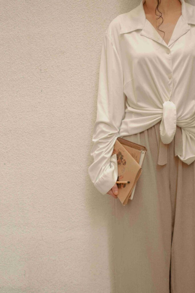 Fluid Fabric A white, fluid, sensual blouse that showcases the fluid fabric.