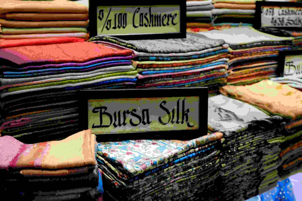 The Glorious Language of Textiles: How Fabrics Influence Feeling & Identity 2 Different Fabrics like silk, cashmere are together.