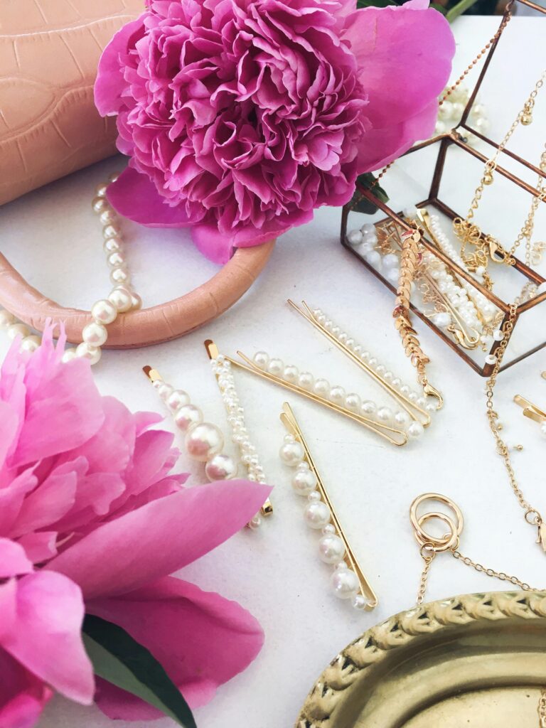 Signature jewellery flatlay with mixed metals