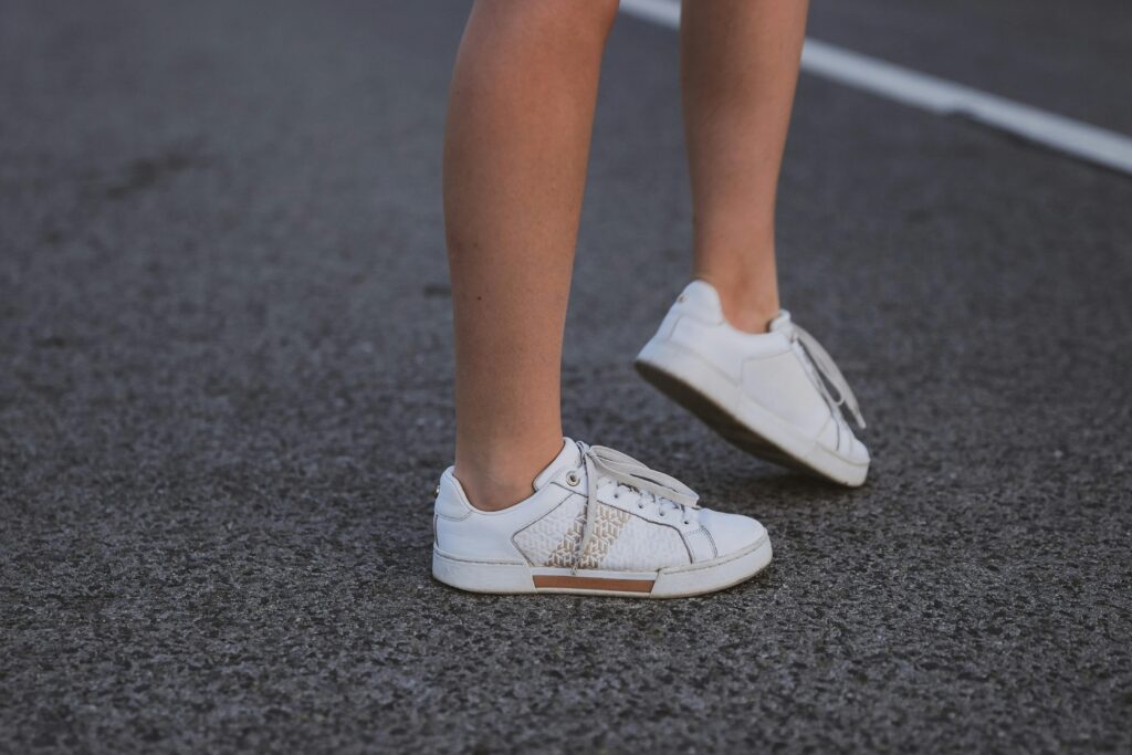 Close-up of a polished flat or clean sneaker in a modern shoe wardrobe